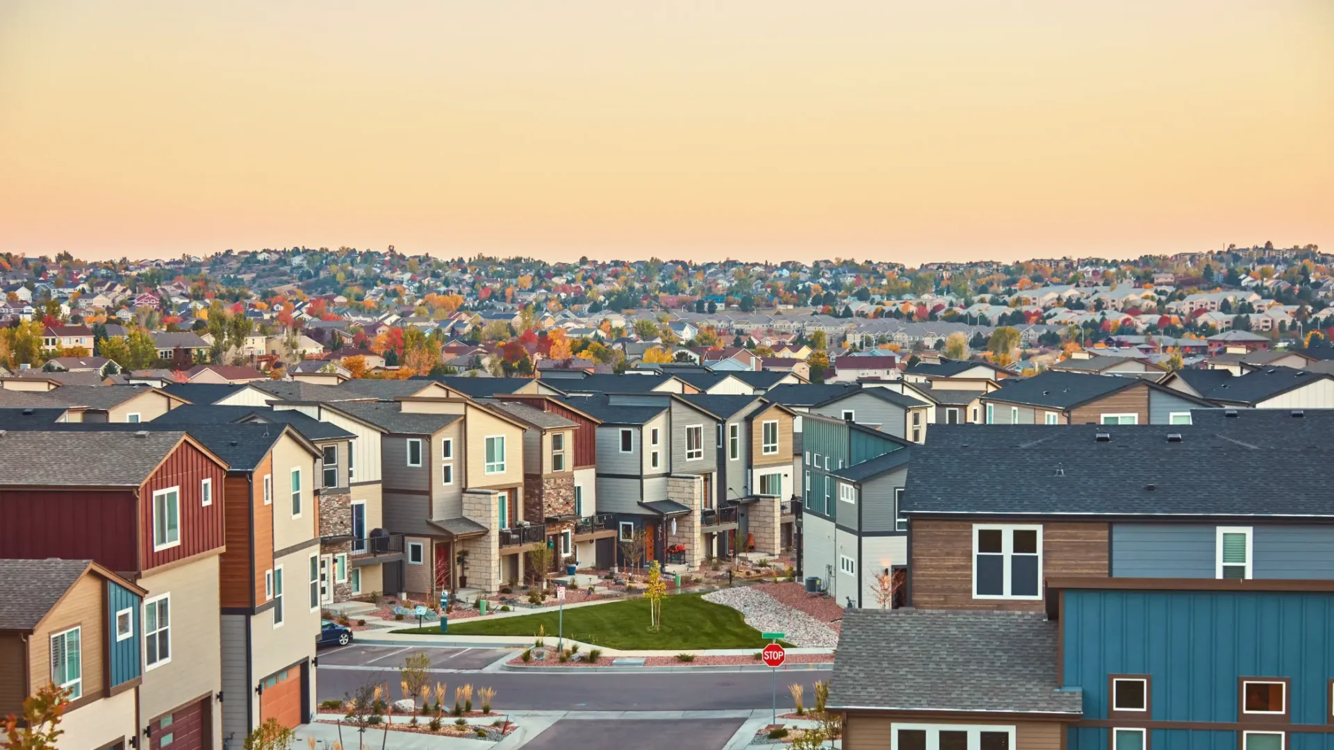 Suburban homes at sunset.