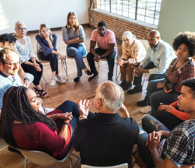 Support group members in a circle.